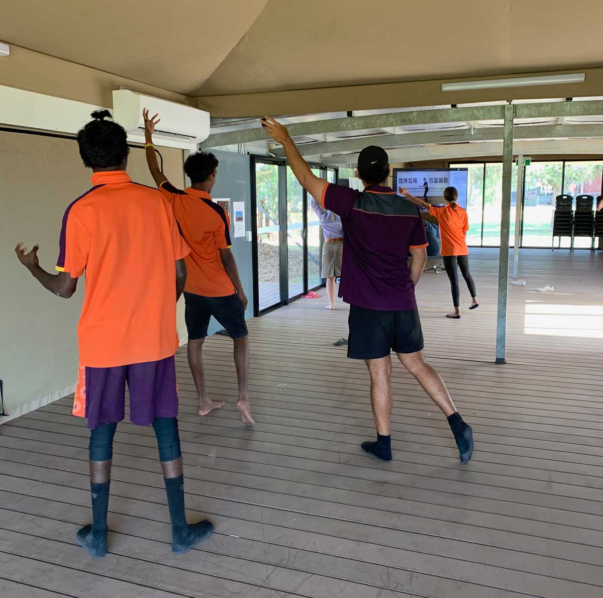 Three students learn ballet at the Yiramalay/Wesley Studio School